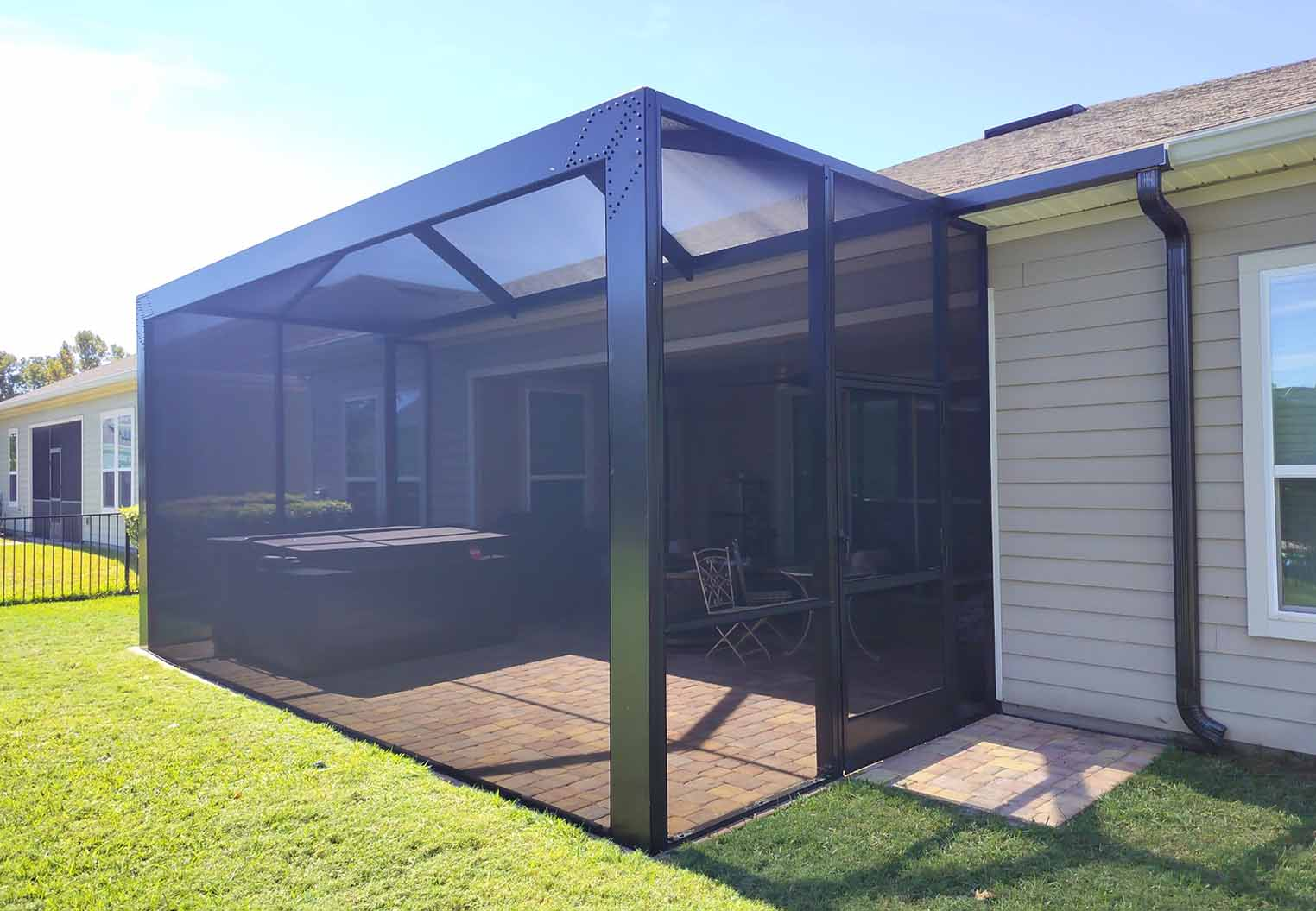 custom screened in patio addition with large seamless screen