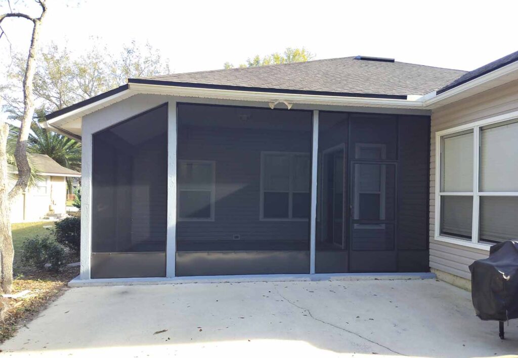 screened in patio with adjoining drivewayjpg