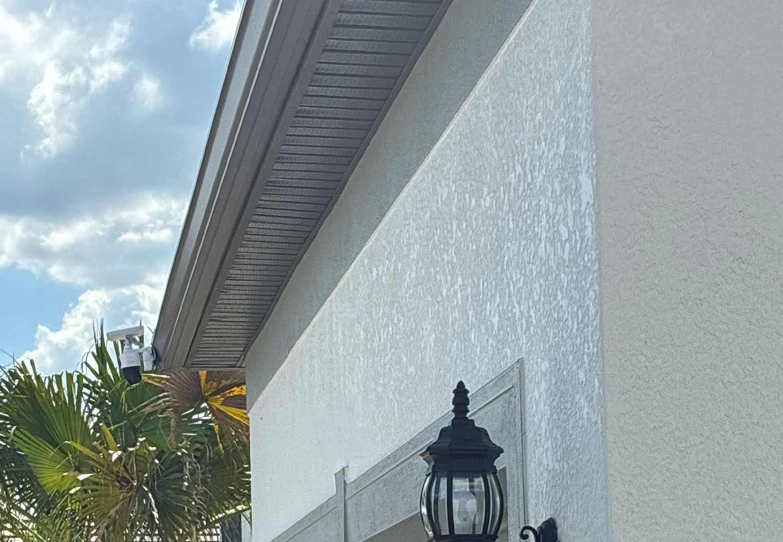 Light grey soffit with matching gutter on a custom homejpg